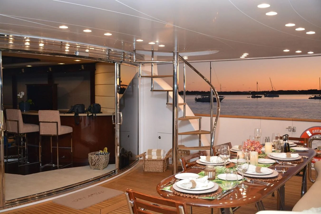 a large kitchen with a table set aboard TRUE NORTH Yacht for Sale