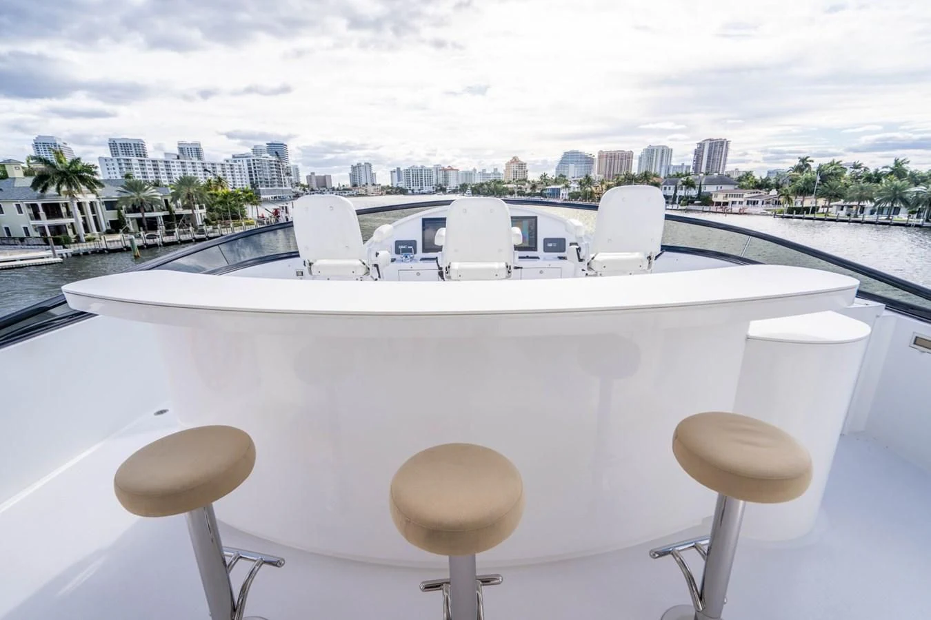 a white table with chairs on it aboard TRUE NORTH Yacht for Sale