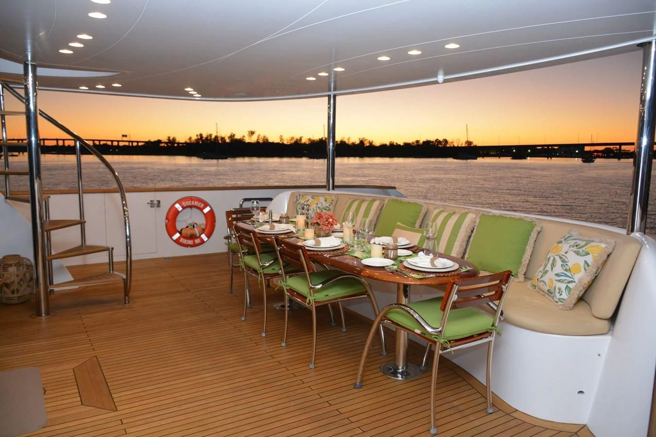 a room with tables and chairs aboard TRUE NORTH Yacht for Sale