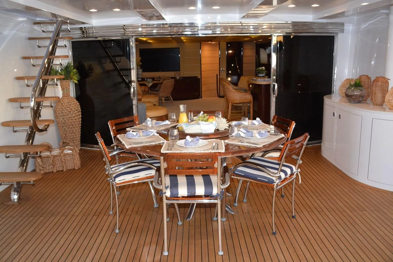 a dining room with a table and chairs aboard TRUE NORTH Yacht for Sale