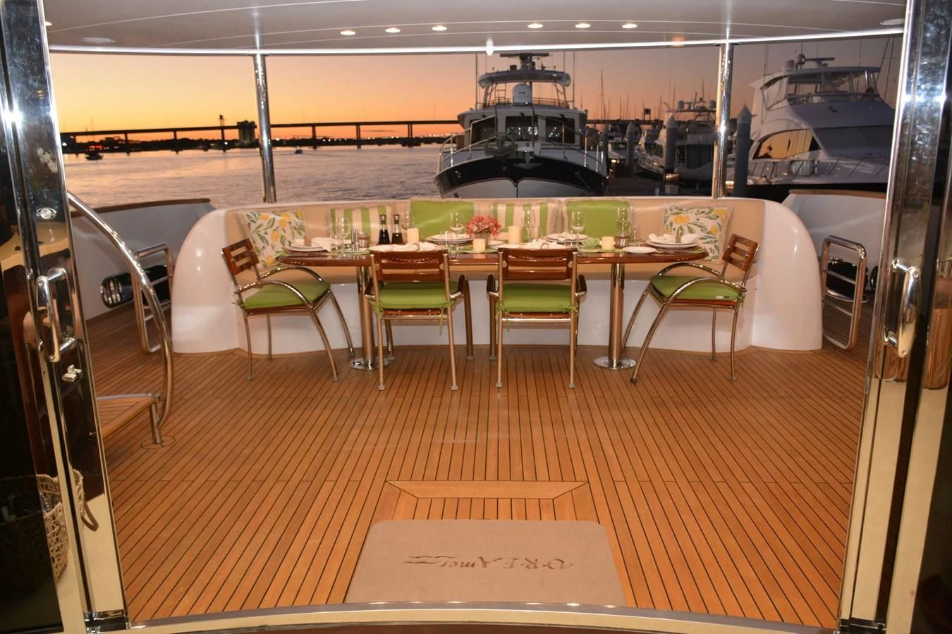 a table with chairs around it aboard TRUE NORTH Yacht for Sale