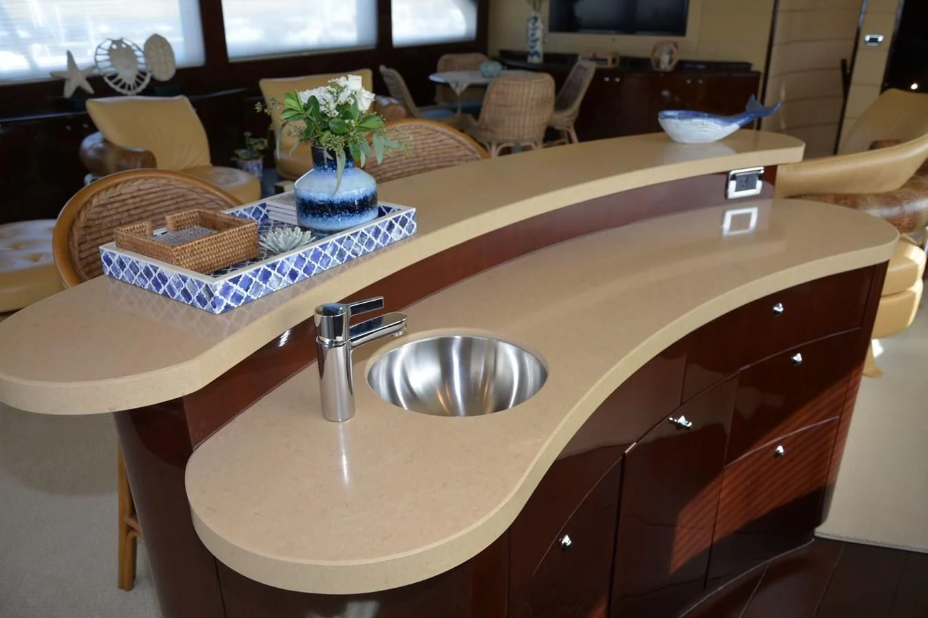 a kitchen counter with a sink and a basket on it aboard TRUE NORTH Yacht for Sale