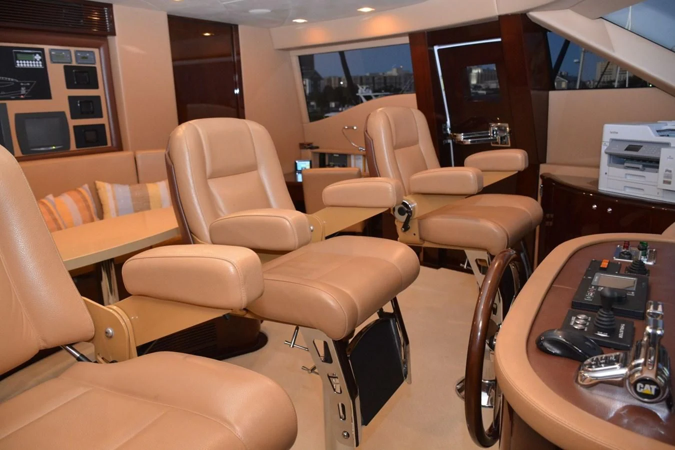 a room with a table and chairs aboard TRUE NORTH Yacht for Sale