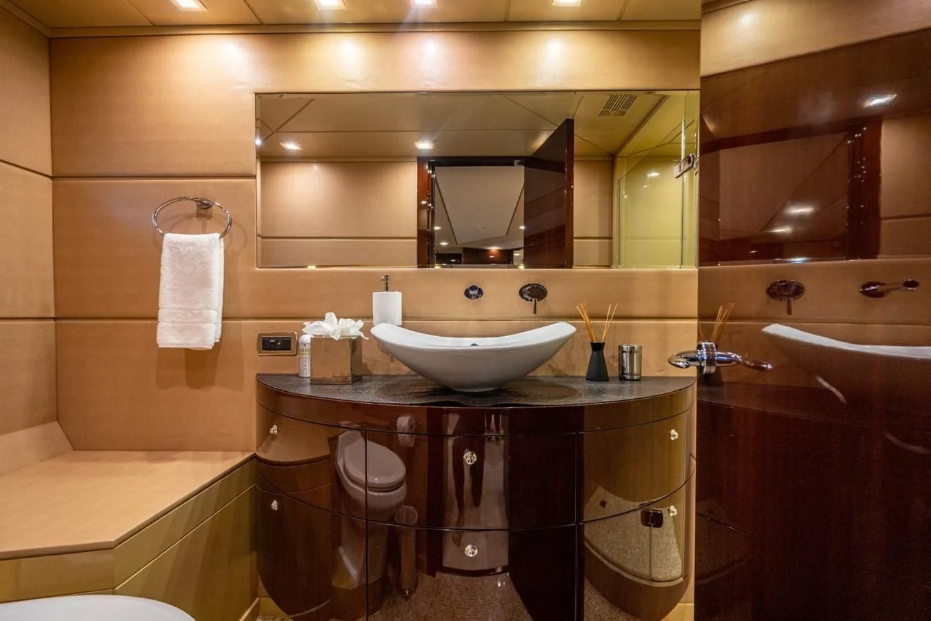 a bathroom with a sink and a mirror aboard TRUE NORTH Yacht for Sale