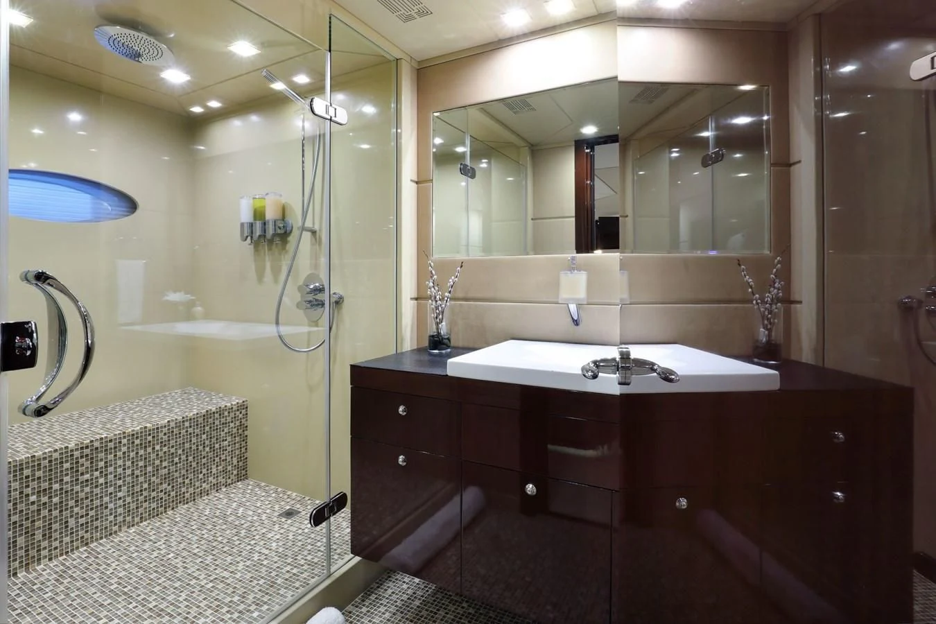 a bathroom with a large mirror aboard TRUE NORTH Yacht for Sale