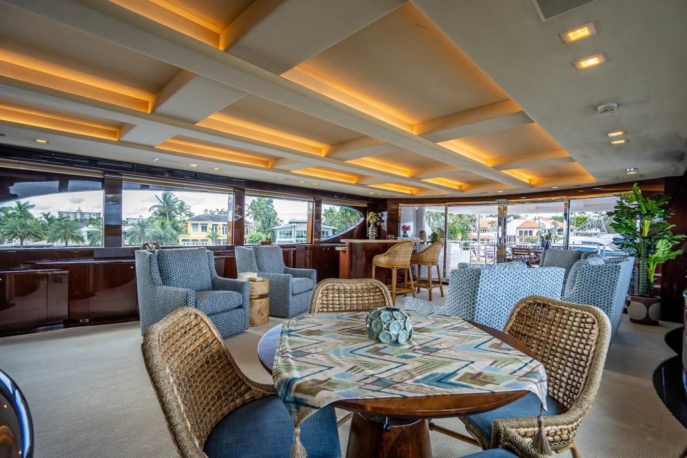 a dining room with a table and chairs aboard TRUE NORTH Yacht for Sale