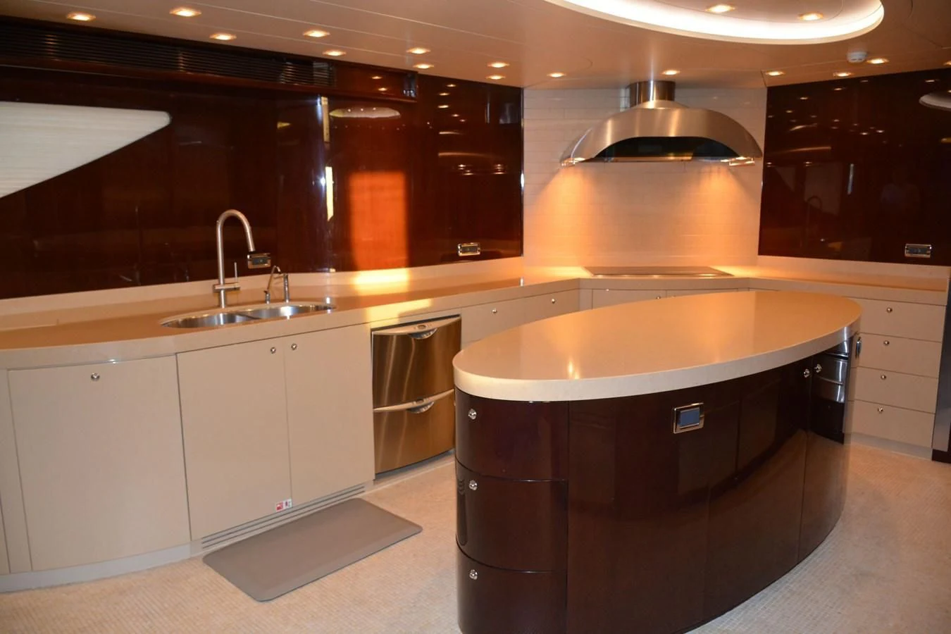 a kitchen with a large island aboard TRUE NORTH Yacht for Sale