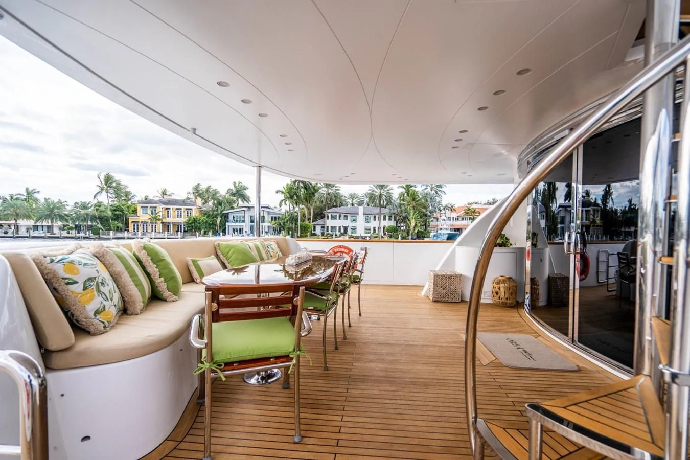 a living room with a glass door aboard TRUE NORTH Yacht for Sale