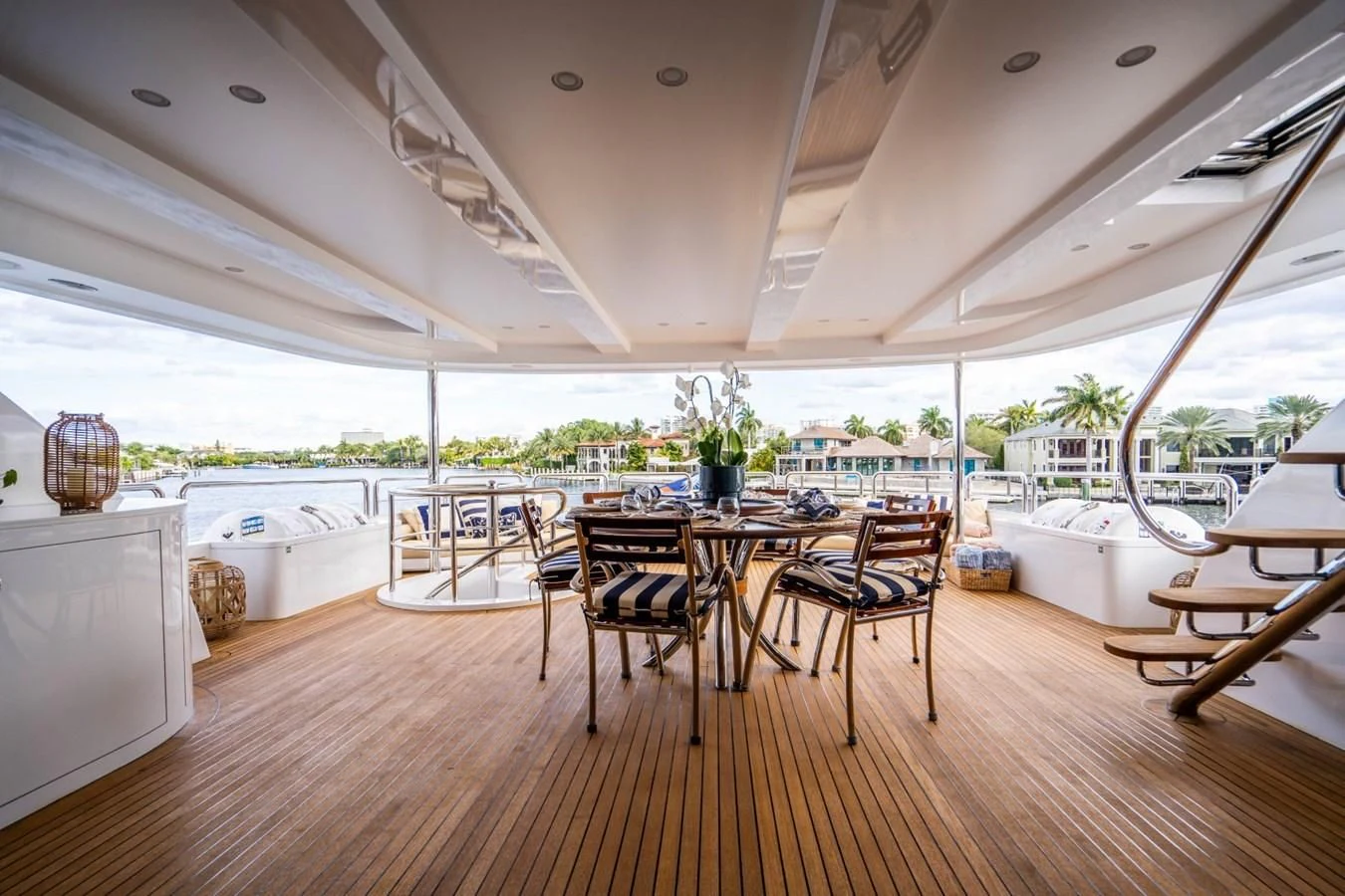 a room with a table and chairs aboard TRUE NORTH Yacht for Sale