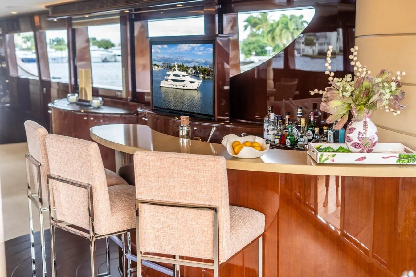 a restaurant with a table and chairs aboard TRUE NORTH Yacht for Sale
