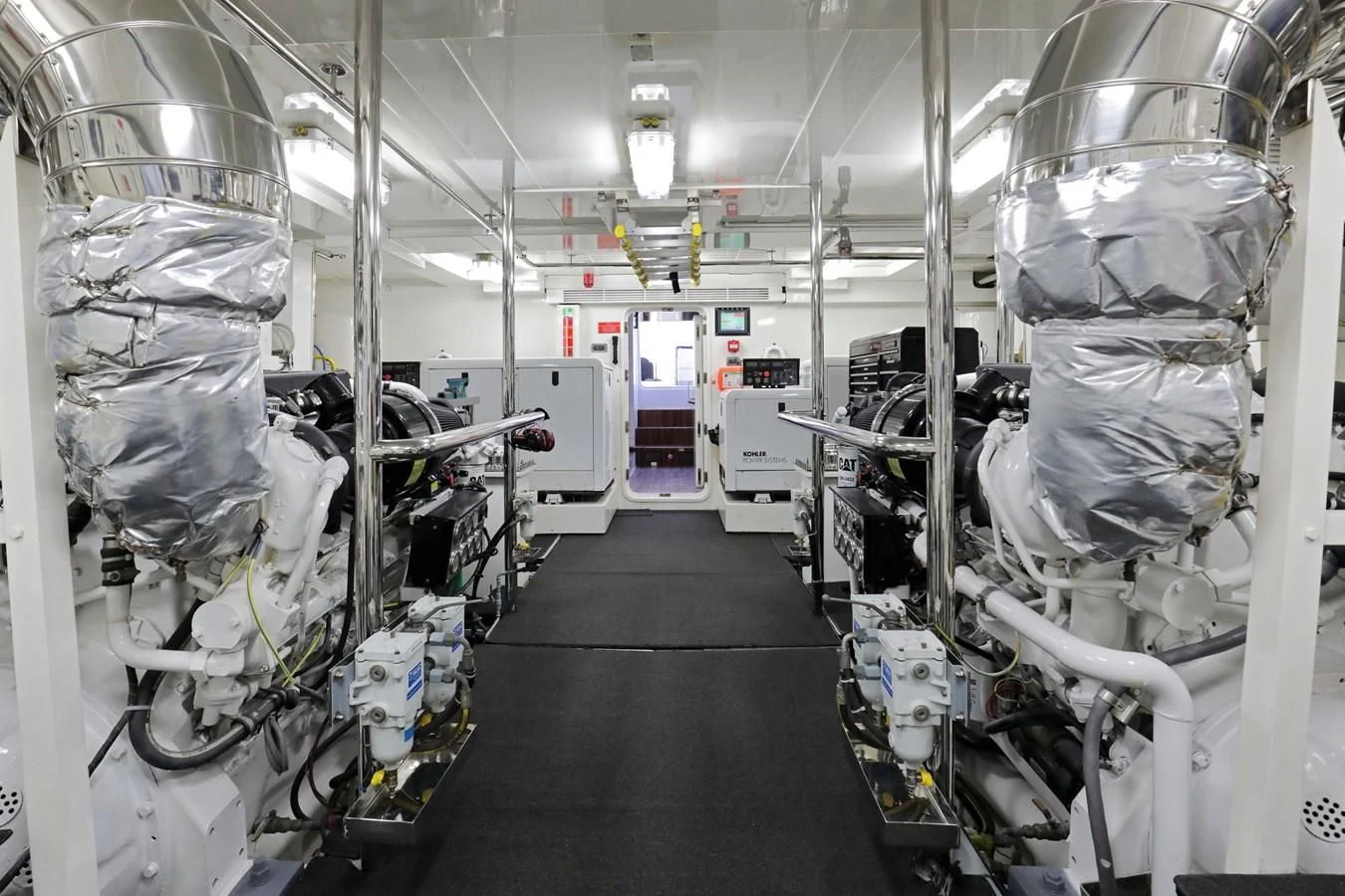 a room with white machines aboard TRUE NORTH Yacht for Sale