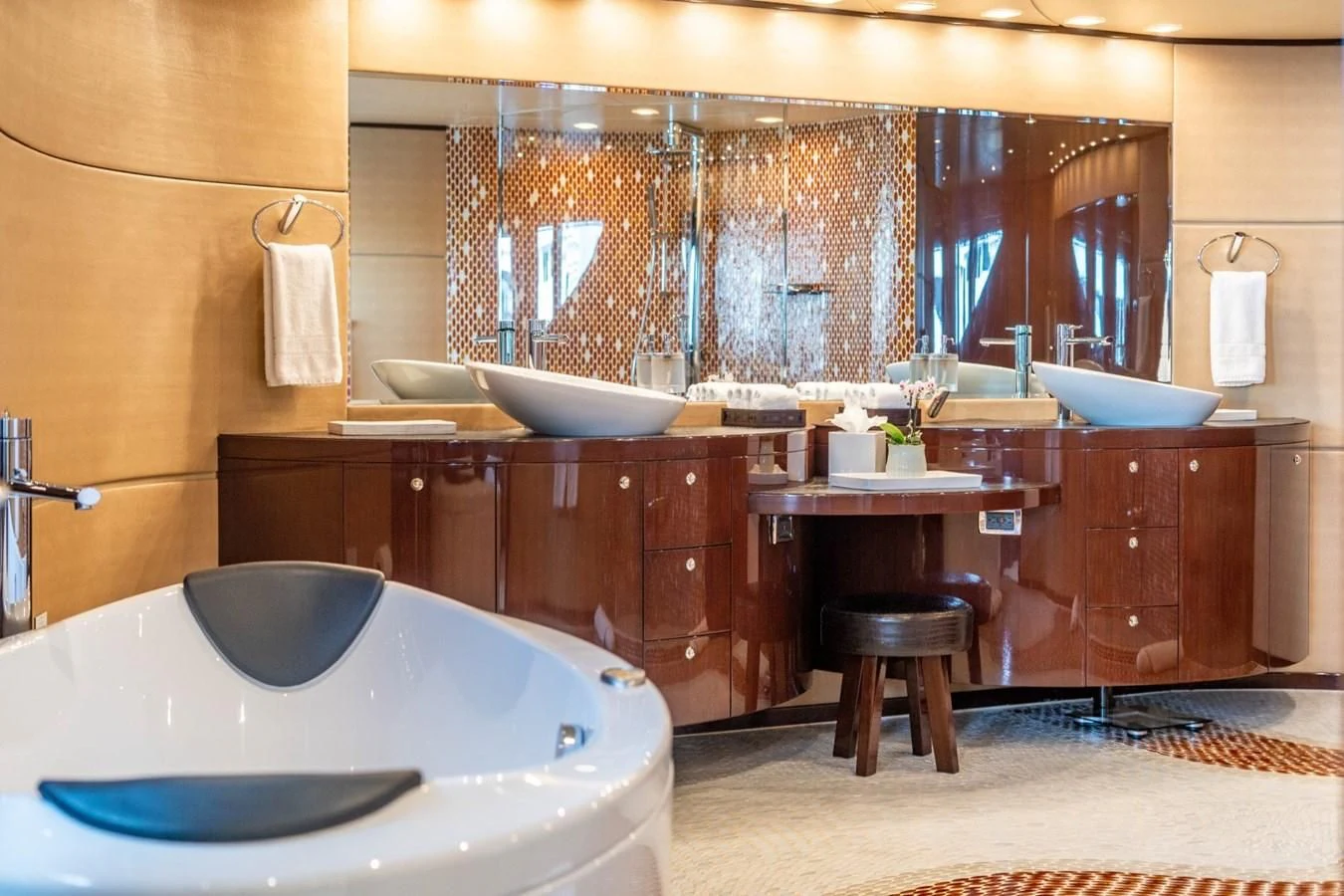 a bathroom with a large mirror aboard TRUE NORTH Yacht for Sale