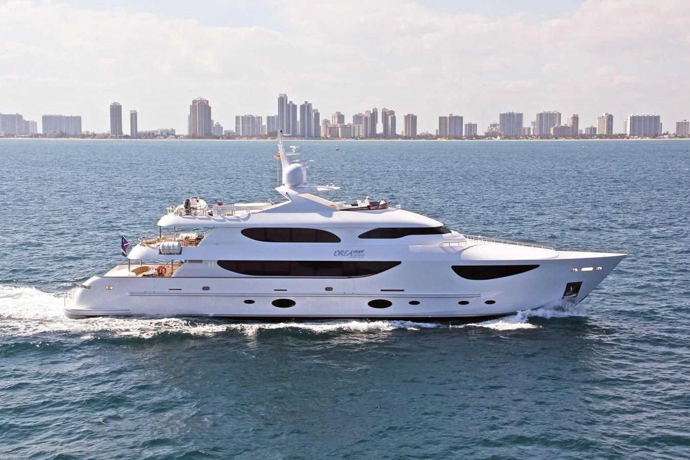 a white yacht in the water aboard TRUE NORTH Yacht for Sale