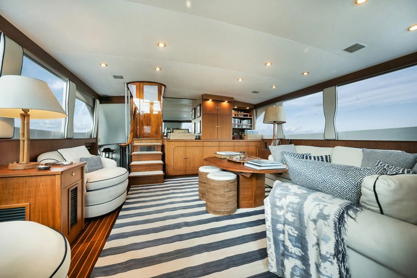 a bedroom with a bed and a desk aboard SHARK Yacht for Sale
