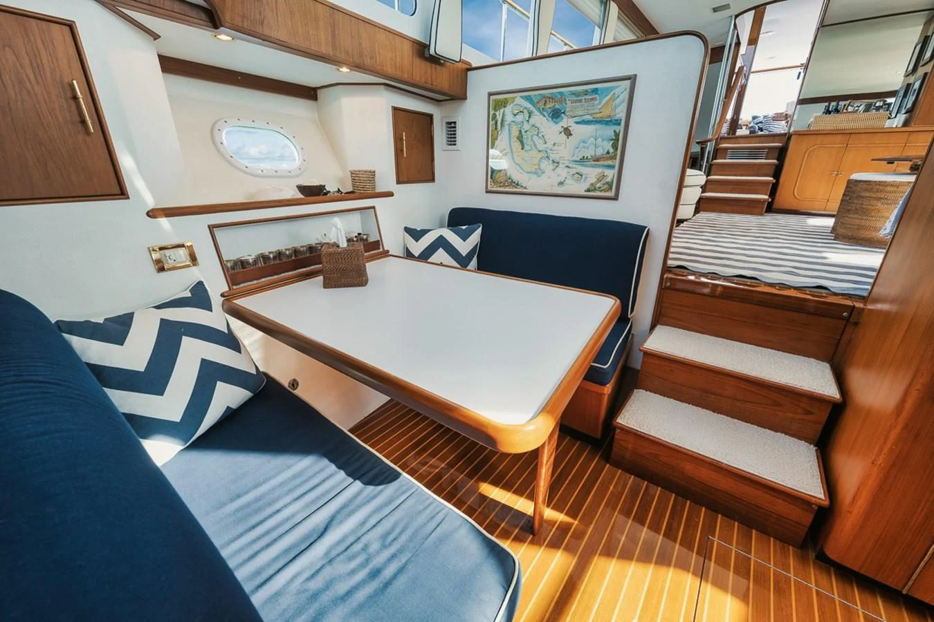a room with a table and chairs aboard SHARK Yacht for Sale
