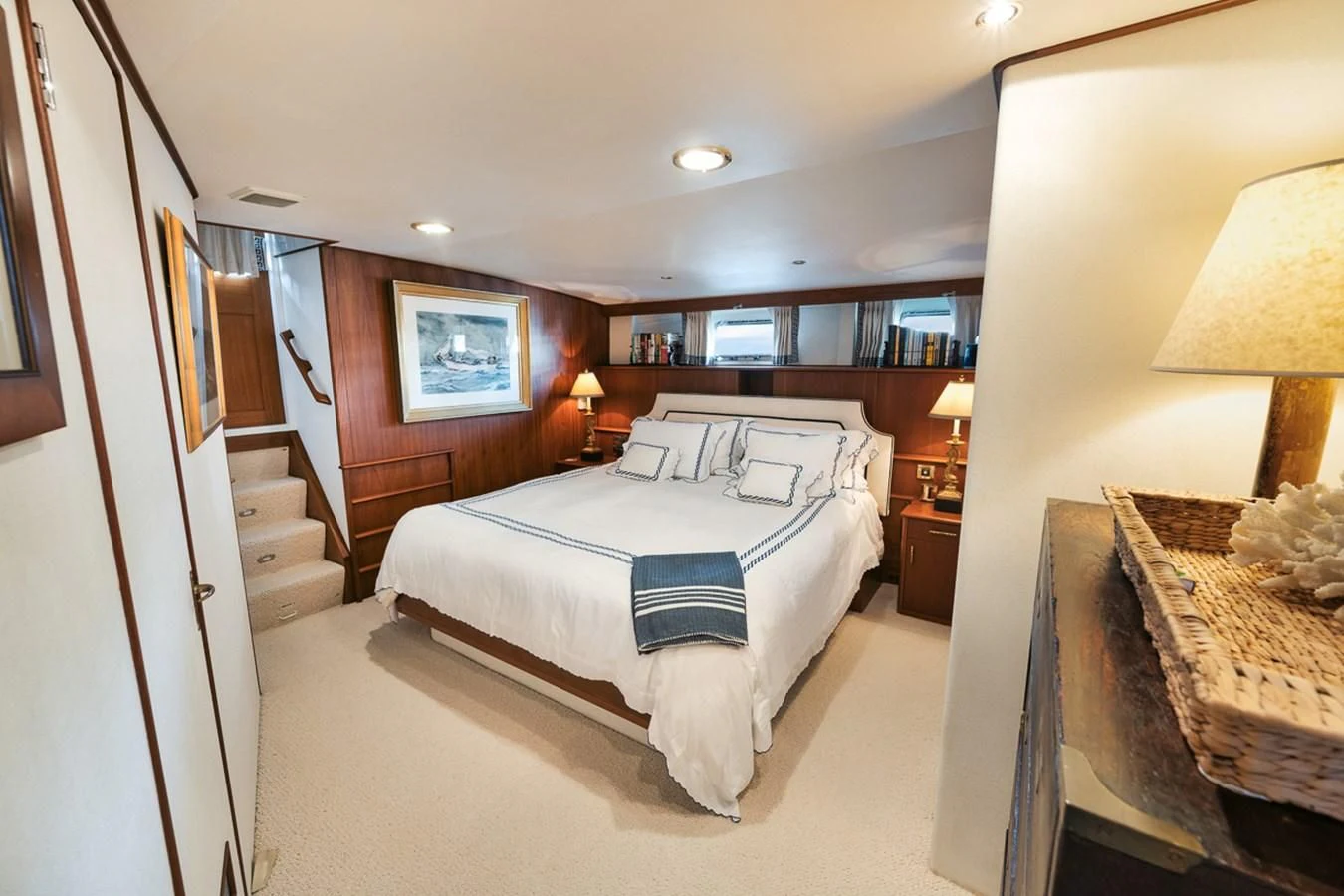 a bedroom with a large bed aboard SHARK Yacht for Sale