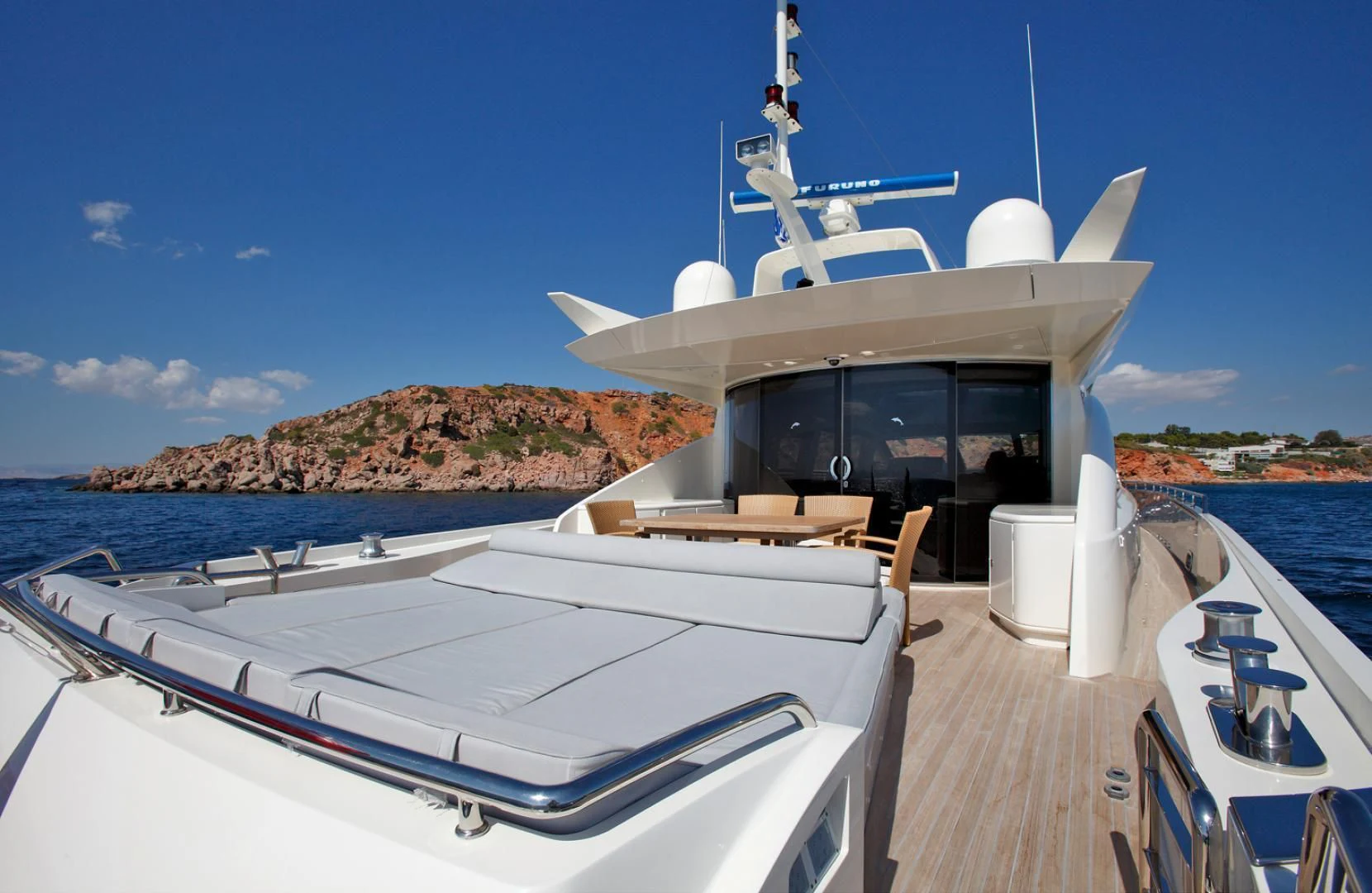 a boat on a dock aboard SUN ANEMOS Yacht for Charter