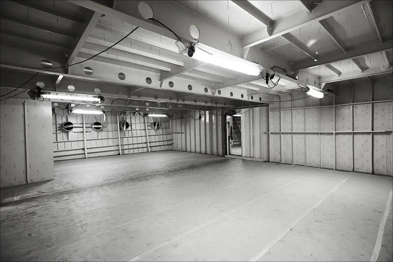 a large room with a lot of equipment in it aboard PROJECT FAITH Yacht for Sale