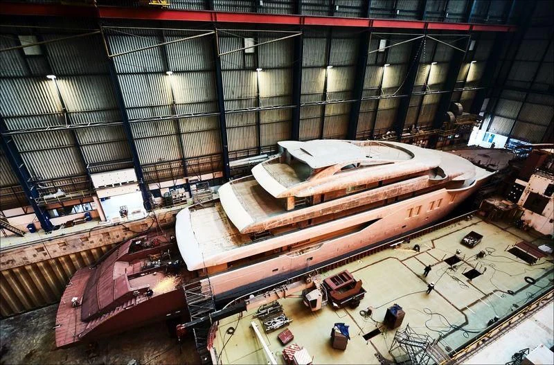 a large room with a large model of a boat on it aboard PROJECT FAITH Yacht for Sale