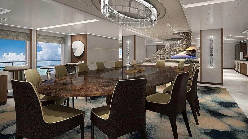 a large room with a table and chairs aboard PROJECT FAITH Yacht for Sale