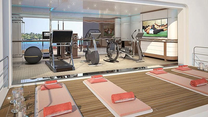 a room with a large mirror and a table with a couple of people on it aboard PROJECT FAITH Yacht for Sale