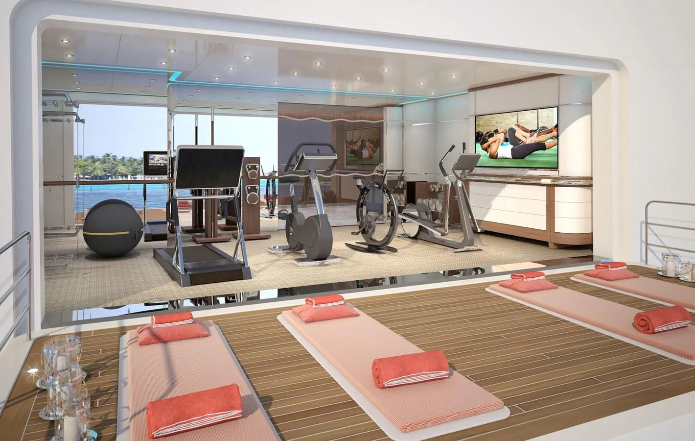 a room with a large mirror and a table with a couple of exercise equipment on it aboard PROJECT FAITH Yacht for Sale