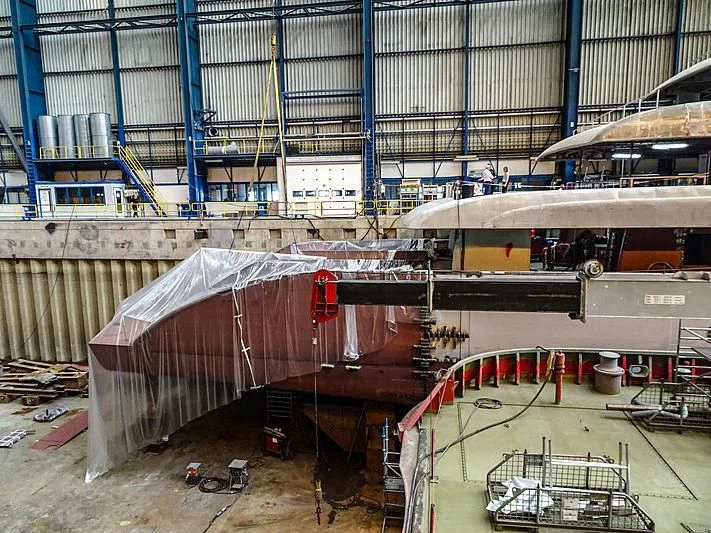a large factory with several machines aboard PROJECT FAITH Yacht for Sale
