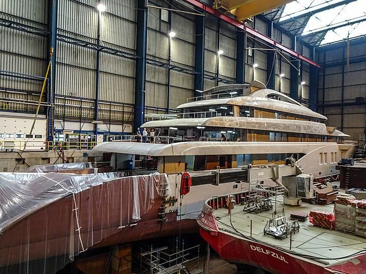 a large ship in a large building aboard PROJECT FAITH Yacht for Sale