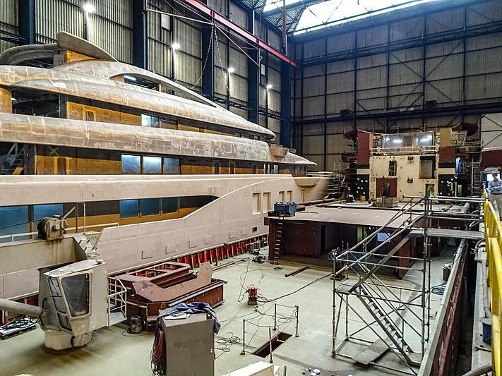 a large factory with several machines aboard PROJECT FAITH Yacht for Sale