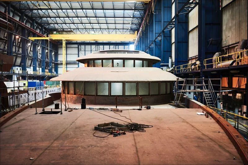 a building with a large stage aboard PROJECT FAITH Yacht for Sale