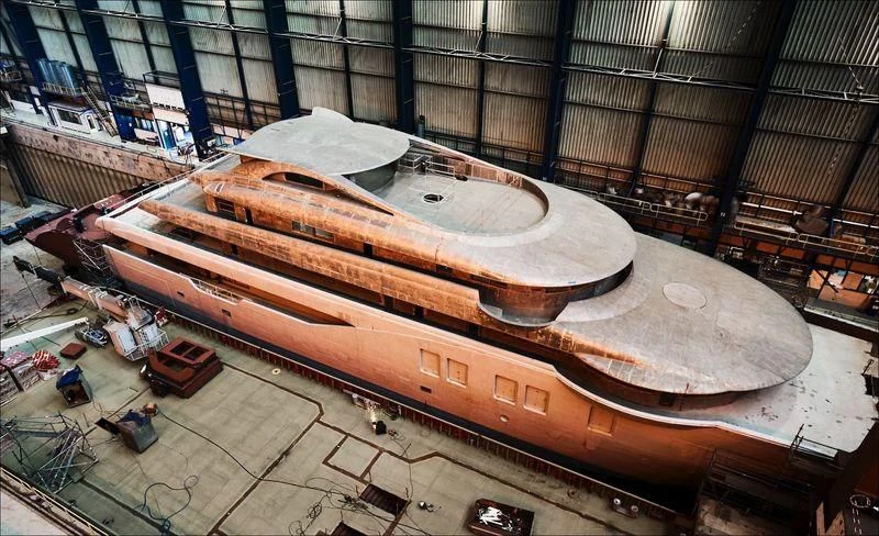 a large metal structure in a warehouse aboard PROJECT FAITH Yacht for Sale