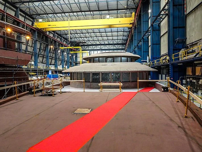 a large building with a red floor aboard PROJECT FAITH Yacht for Sale