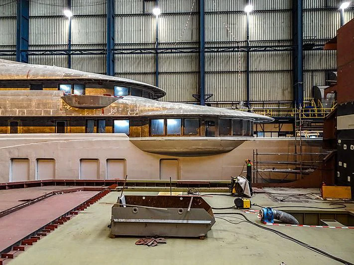 a large warehouse with a large warehouse aboard PROJECT FAITH Yacht for Sale