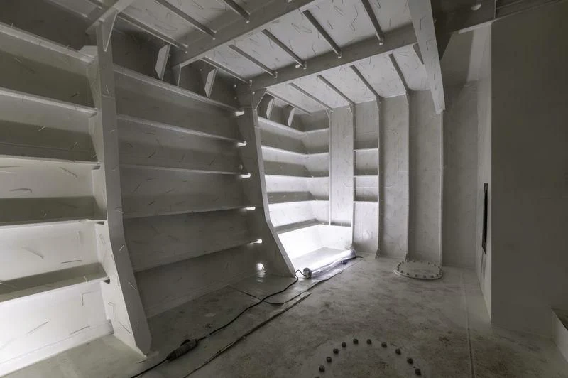 a room with a staircase aboard PROJECT FAITH Yacht for Sale