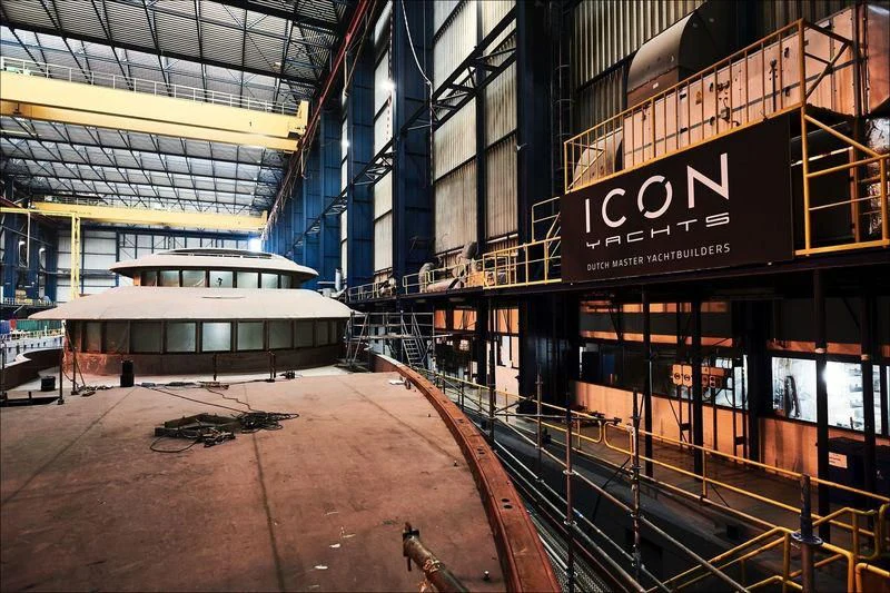 a large building with a sign on the front aboard PROJECT FAITH Yacht for Sale