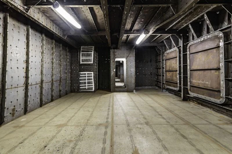 a room with a lot of wood aboard PROJECT FAITH Yacht for Sale