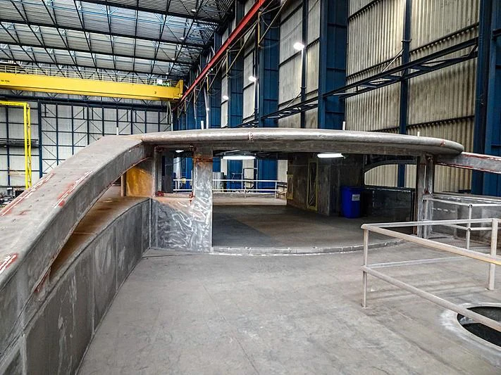 a warehouse with a large pipe aboard PROJECT FAITH Yacht for Sale