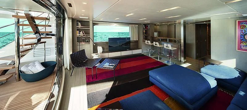 a room with a bed and a couch aboard BLUE AGAVE Yacht for Sale