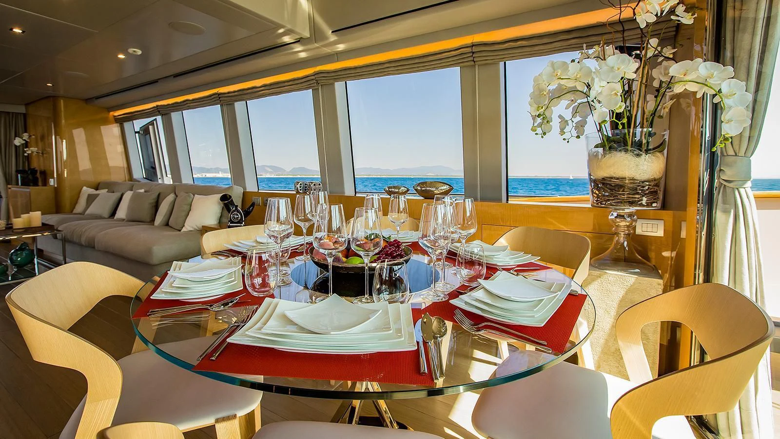 a table set for a dinner aboard VERSILCRAFT V86 Yacht for Sale
