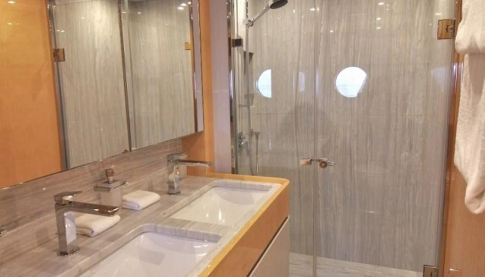 a bathroom with two sinks aboard VERSILCRAFT V86 Yacht for Sale