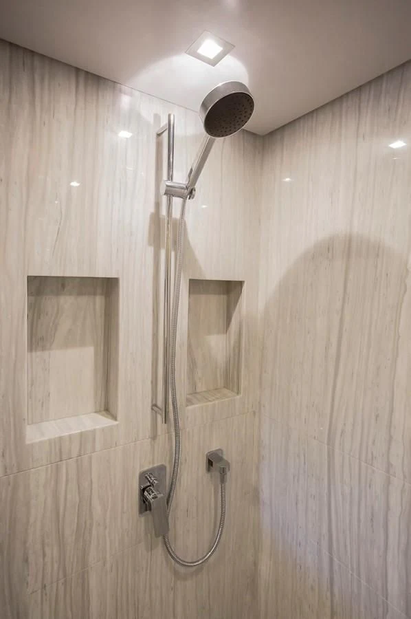 a shower with two mirrors aboard VERSILCRAFT V86 Yacht for Sale