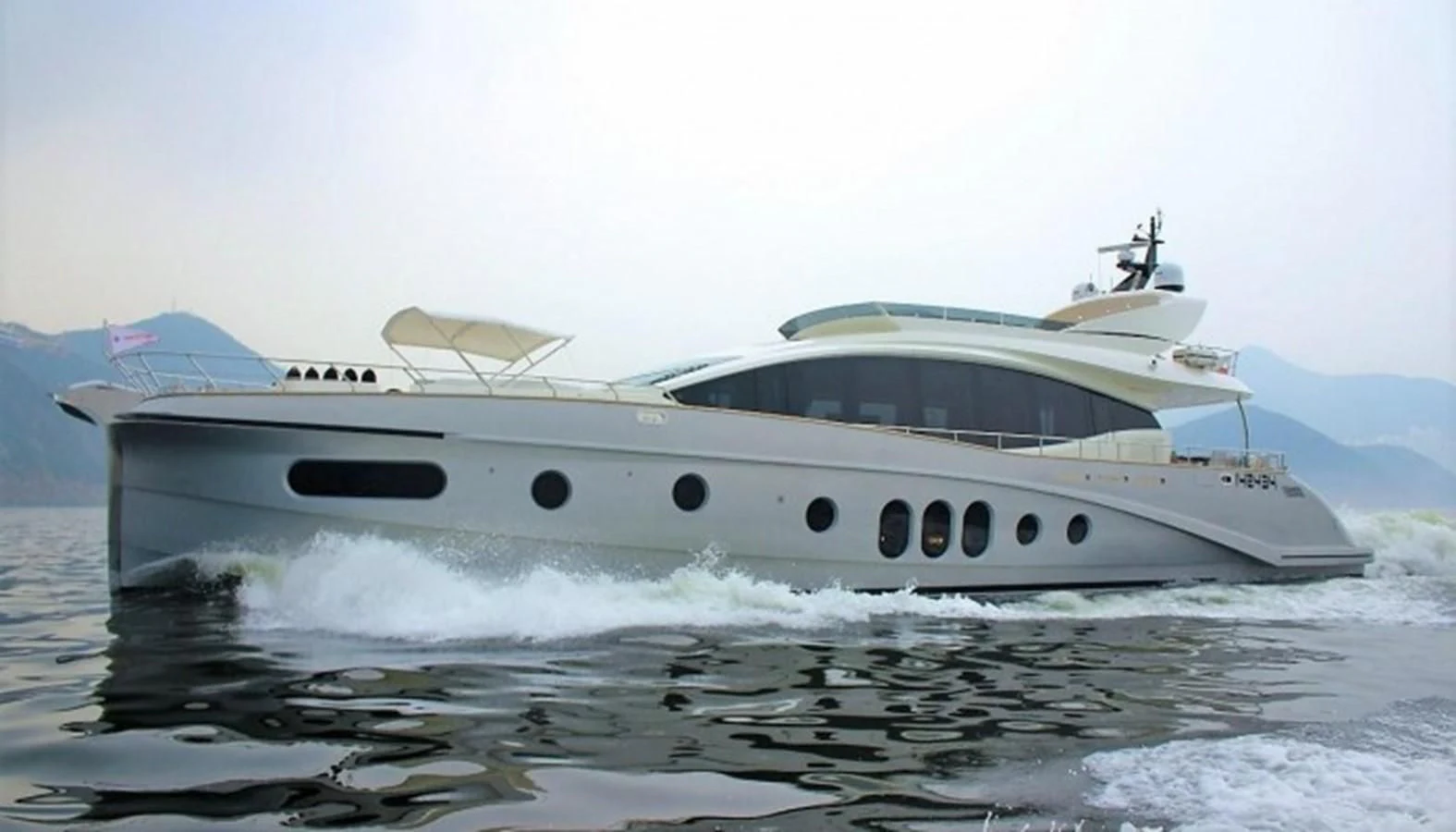 a boat in the water aboard VERSILCRAFT V86 Yacht for Sale