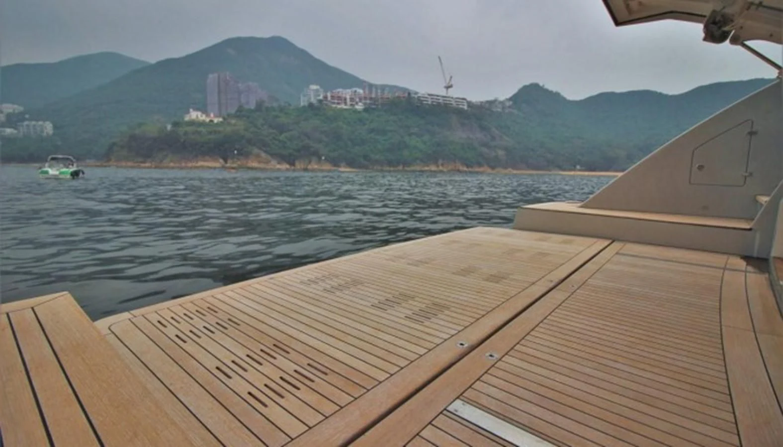 a boat on the water aboard VERSILCRAFT V86 Yacht for Sale