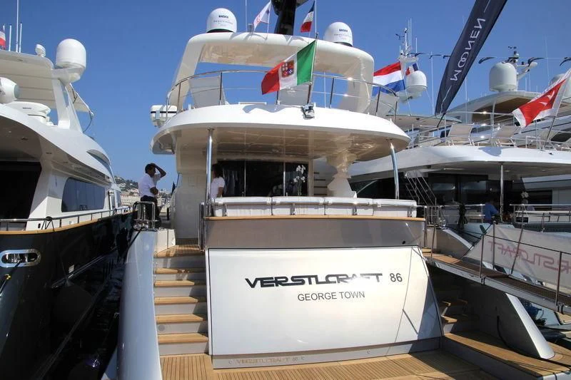 a boat with a sign on the front aboard VERSILCRAFT V86 Yacht for Sale