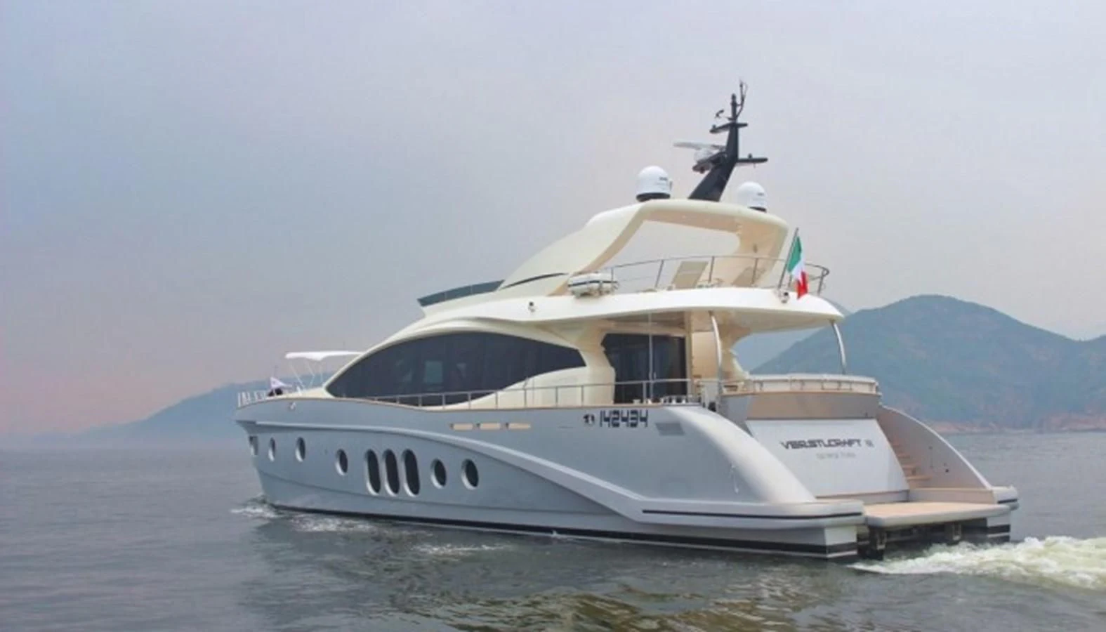 a boat in the water aboard VERSILCRAFT V86 Yacht for Sale
