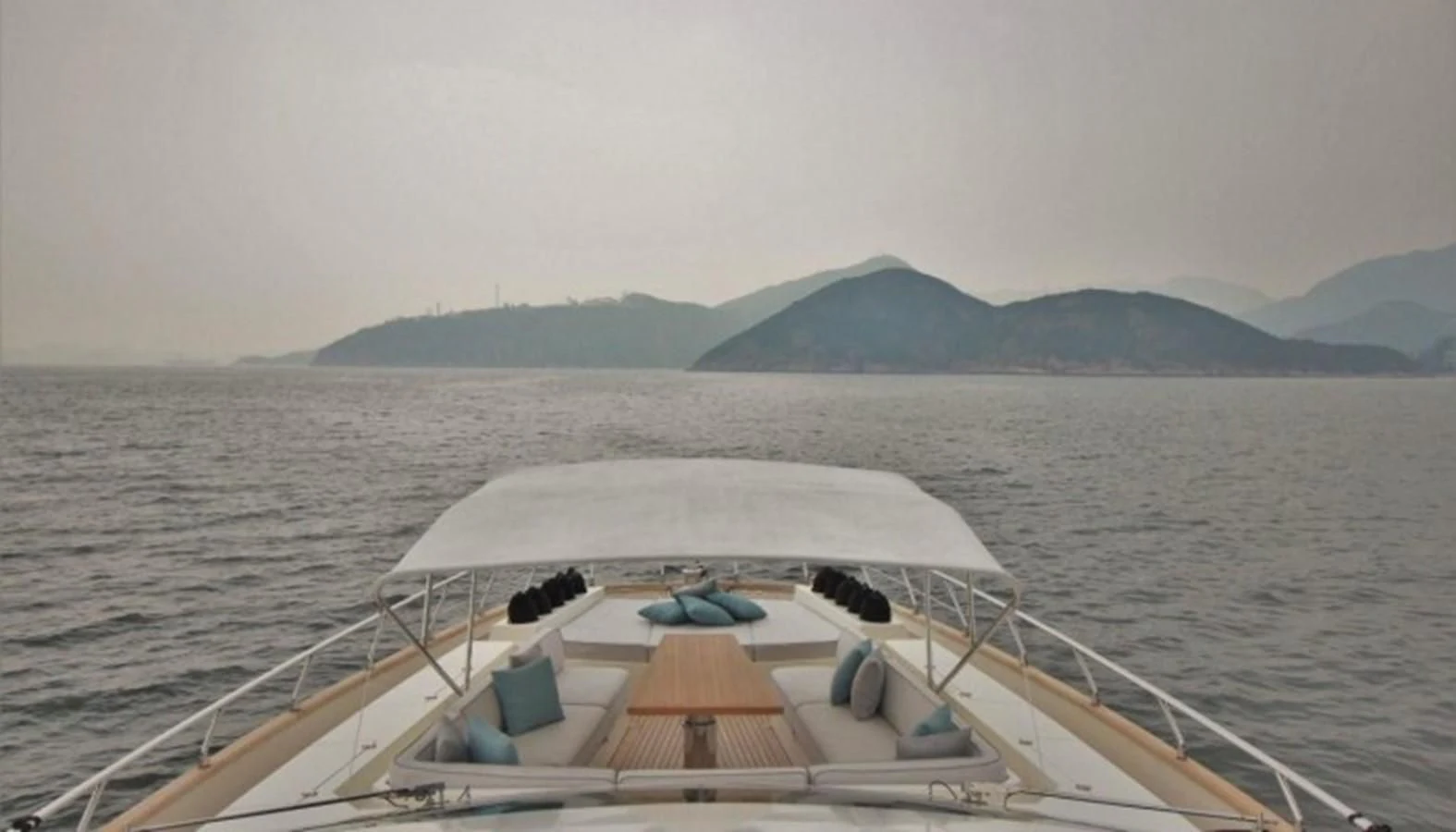 a boat on the water aboard VERSILCRAFT V86 Yacht for Sale