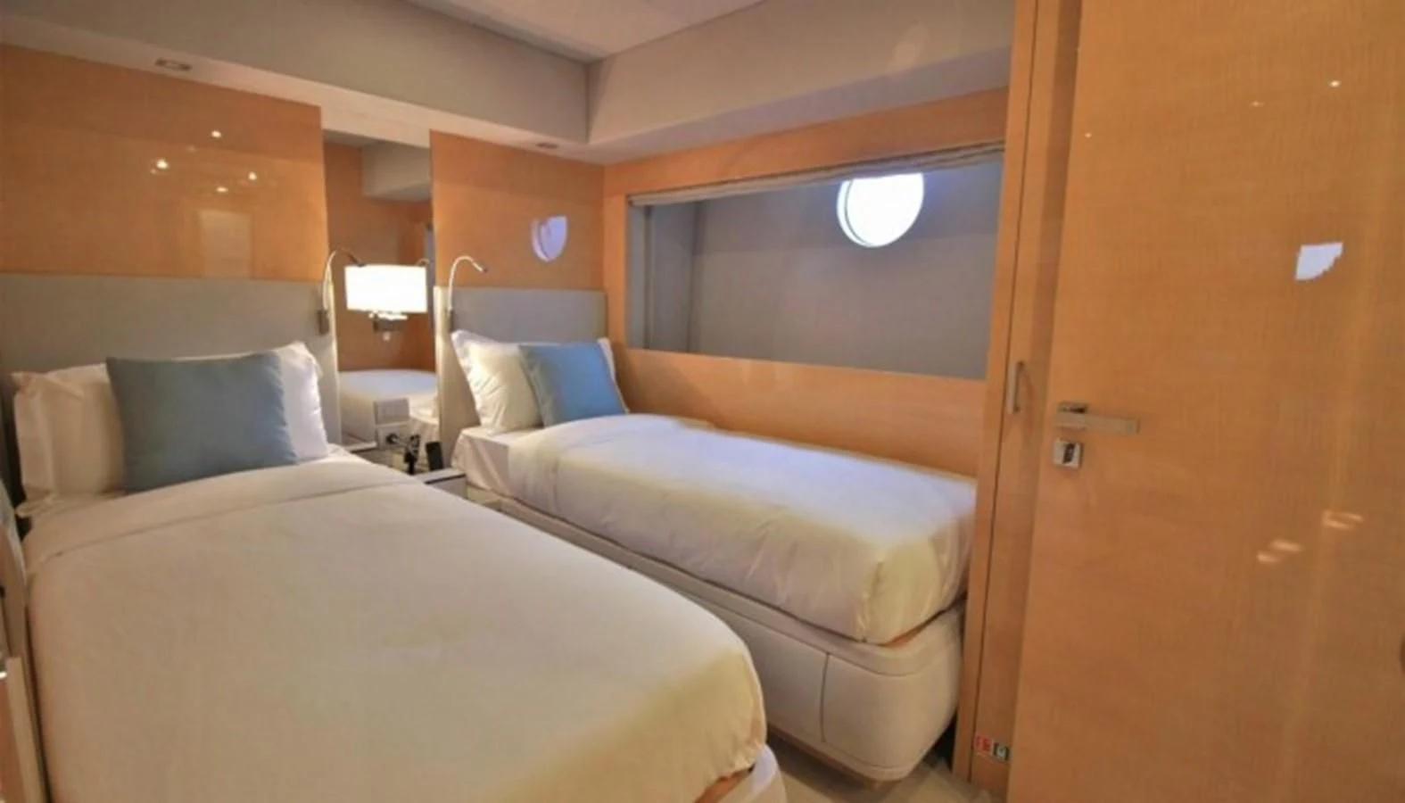 a room with two beds aboard VERSILCRAFT V86 Yacht for Sale