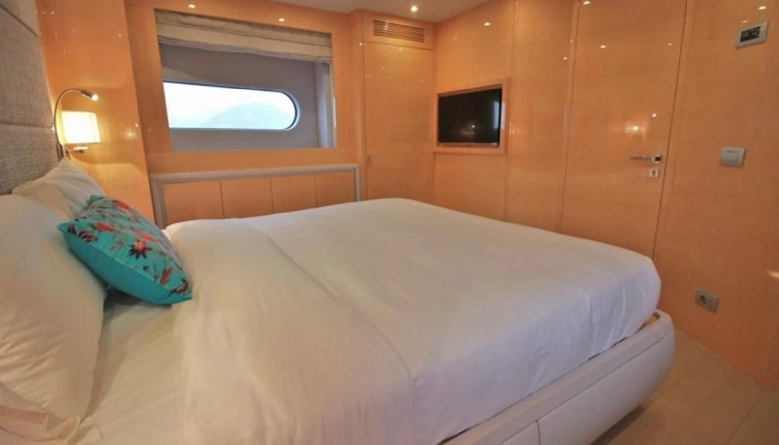 a bed in a room aboard VERSILCRAFT V86 Yacht for Sale