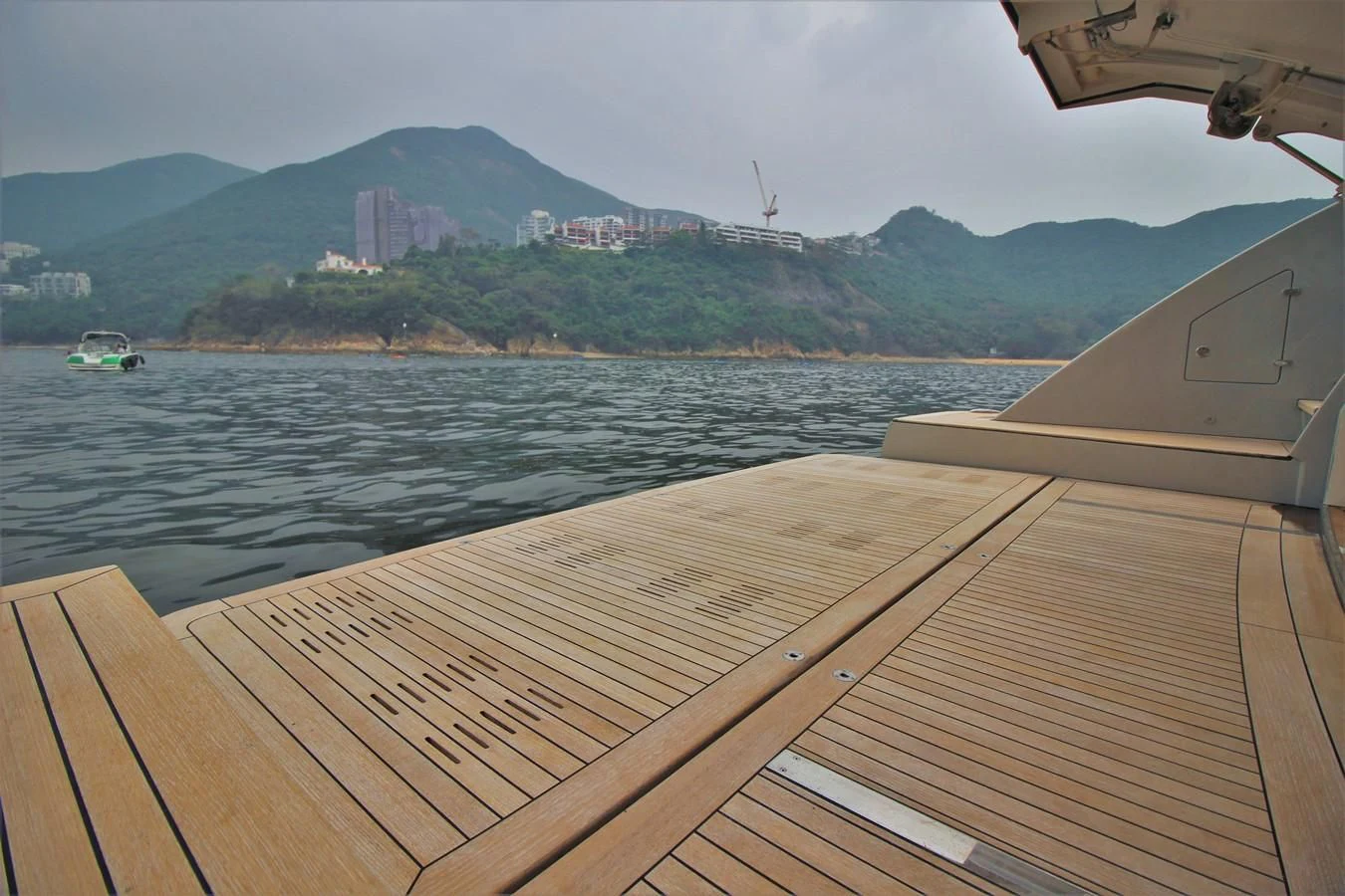 a boat on the water aboard VERSILCRAFT V86 Yacht for Sale