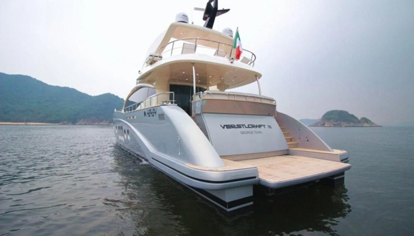 a boat on the water aboard VERSILCRAFT V86 Yacht for Sale